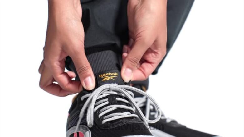 ridgerider 6 apavi sievietes 0T464232 Reebok kodols melns/trekns violets/oranžs uzliesmojums