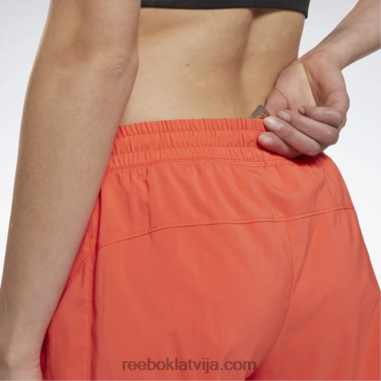 skriešanas šorti sievietes 0T464554 Reebok daļēji oranžs uzliesmojums